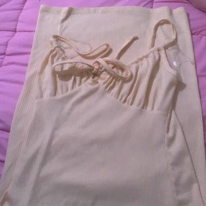 yellow medium sized dress,never been worn,washed aswell